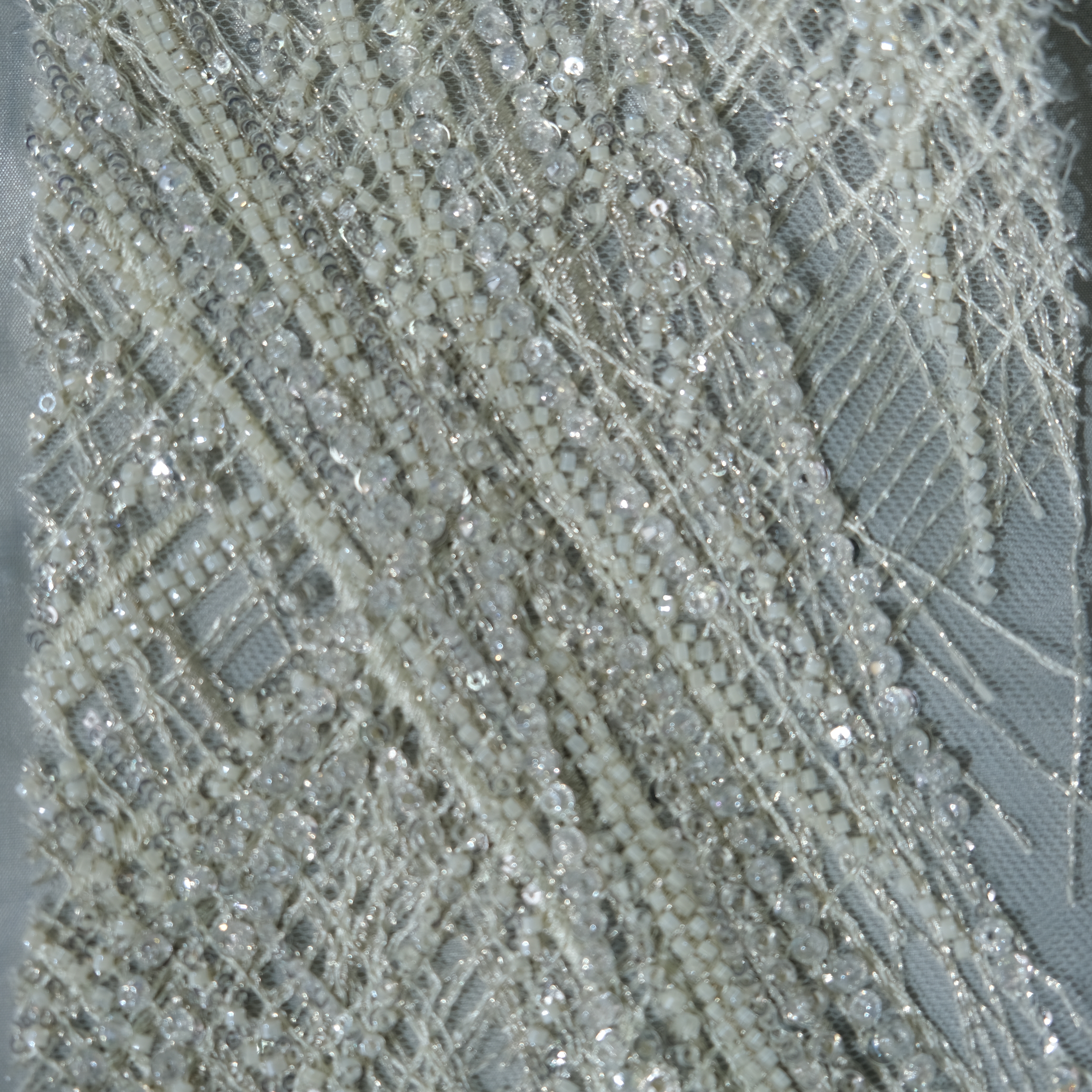 Radiant Burst Embroidery Fabric in BeigeYellow color