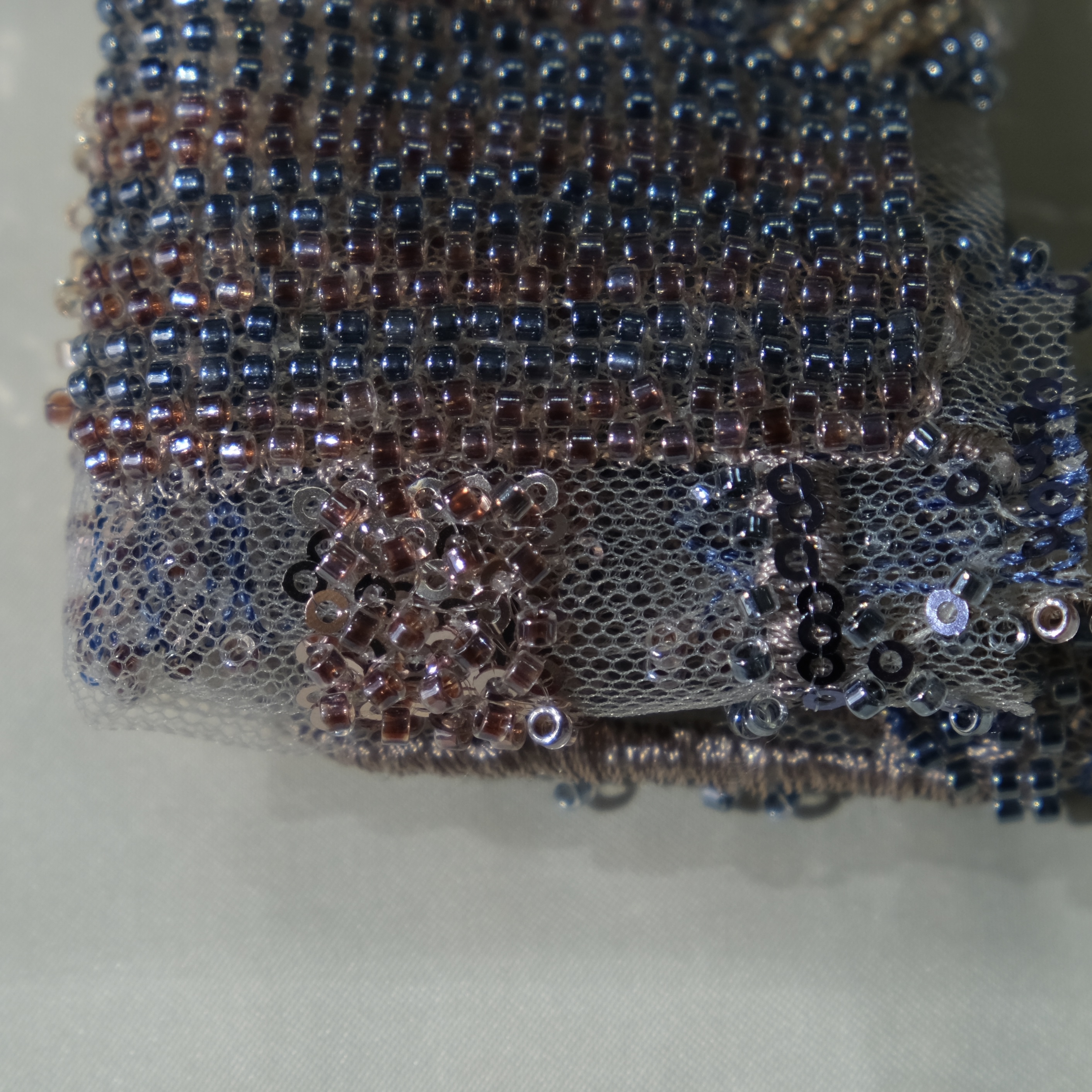 Organic Weave Embroidery Fabric in BrownBlue color