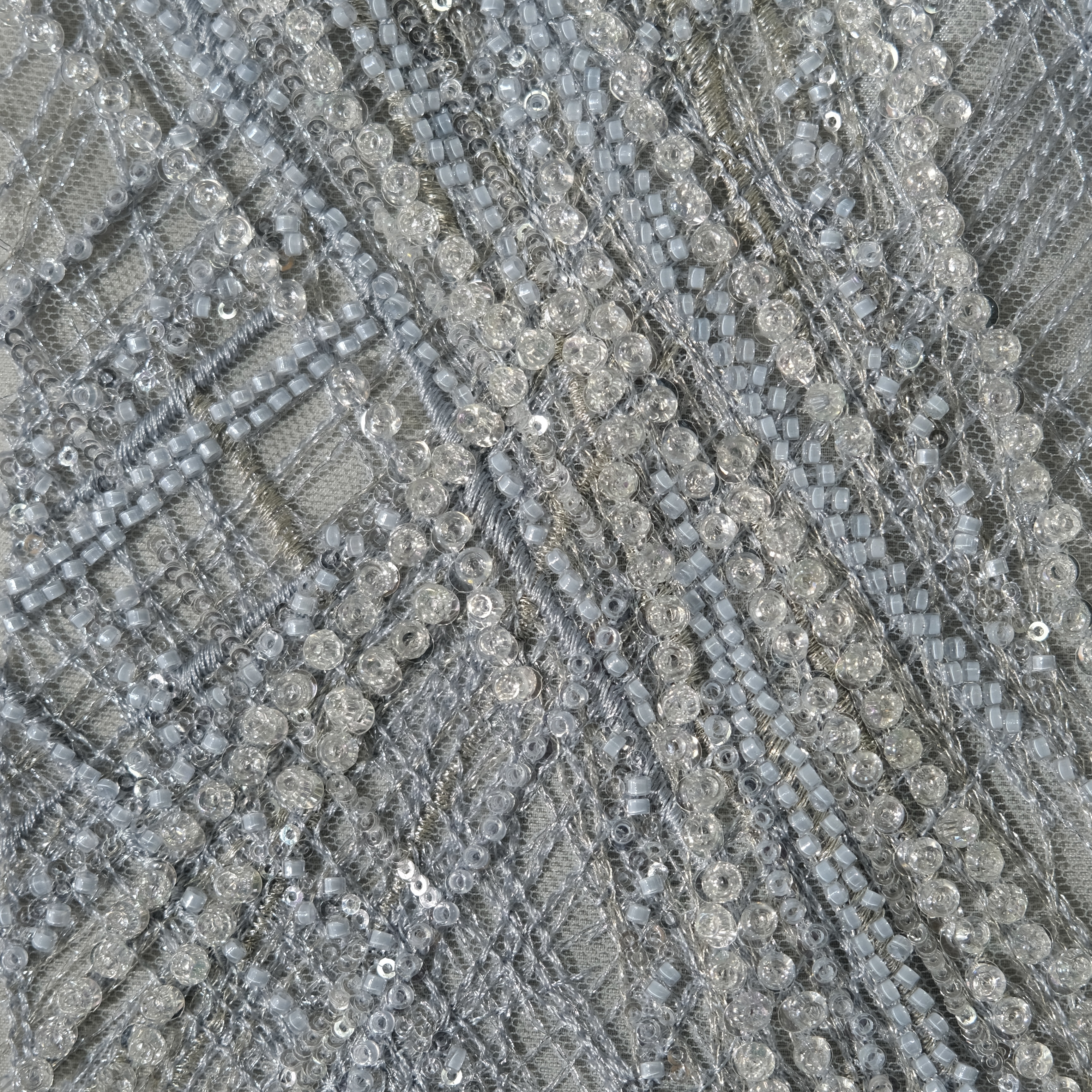 Radiant Burst Embroidery Fabric in LightGreen color