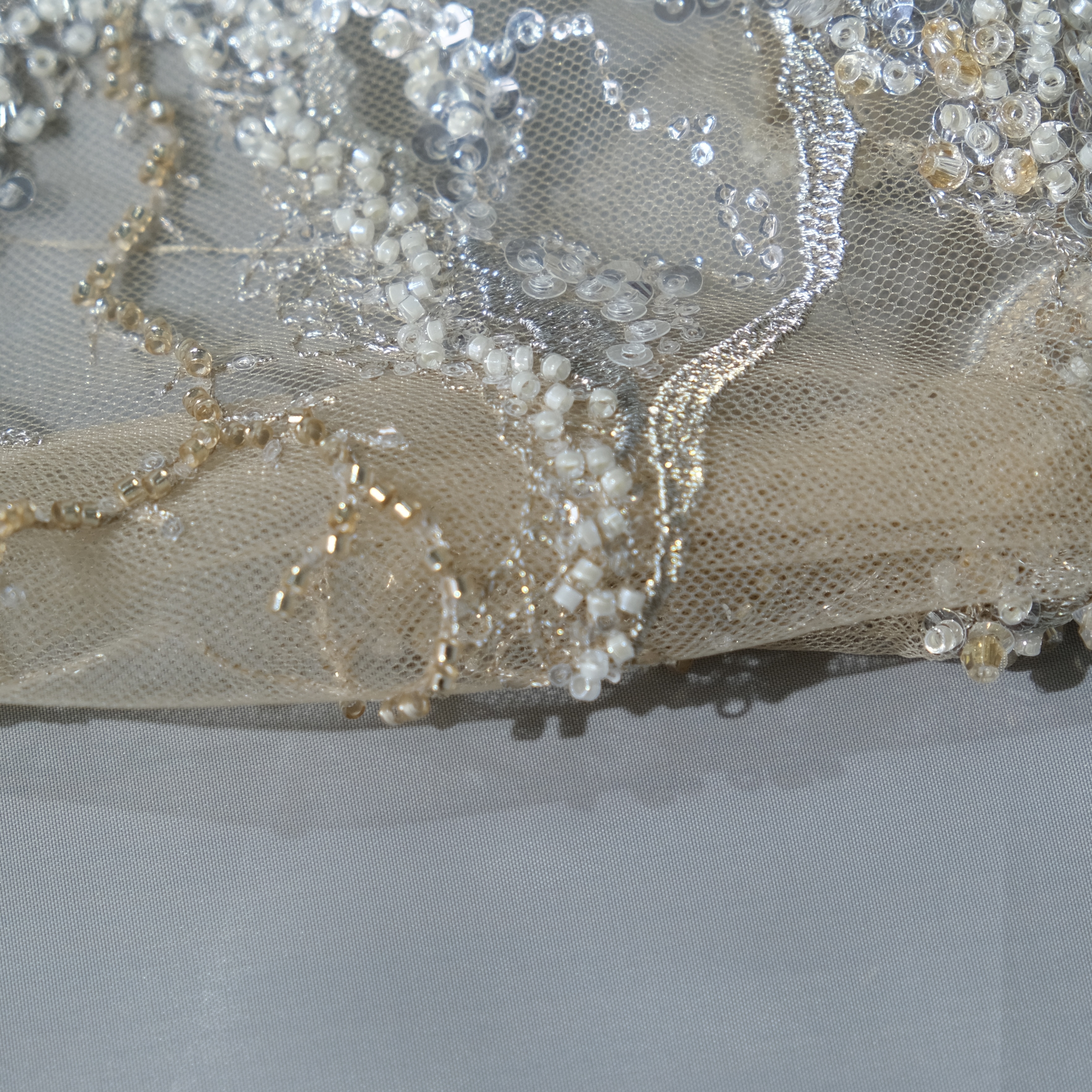 Veinflow Embroidery Fabric in Golden color