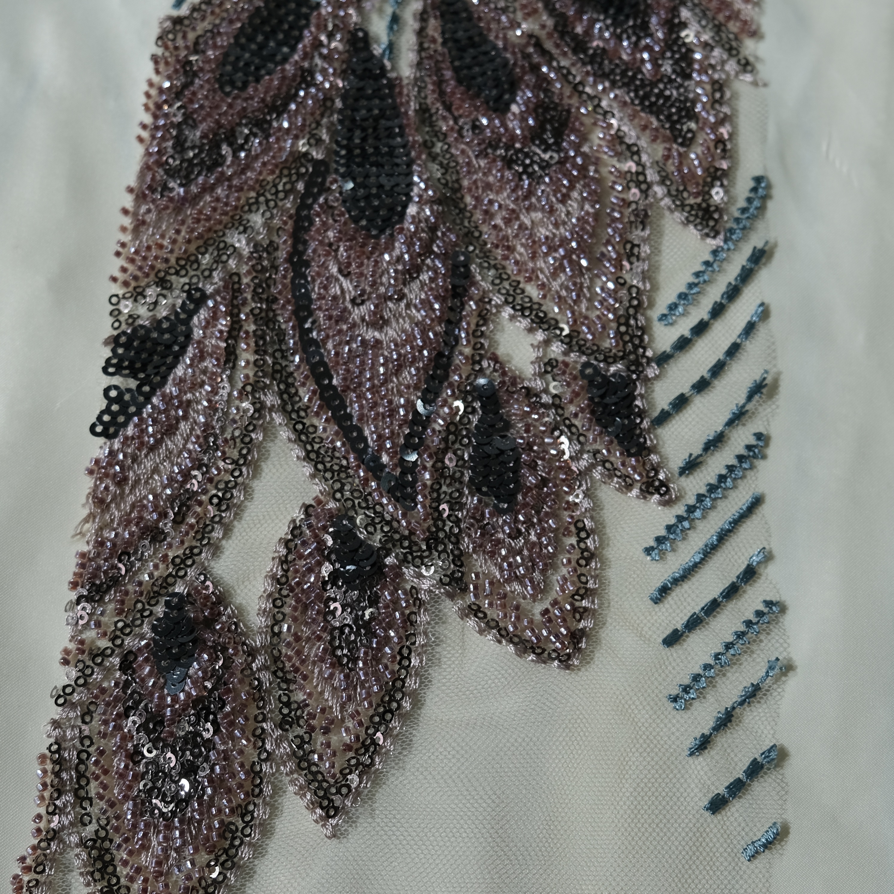 Peacock Feather Embroidery Fabric in BluePink color