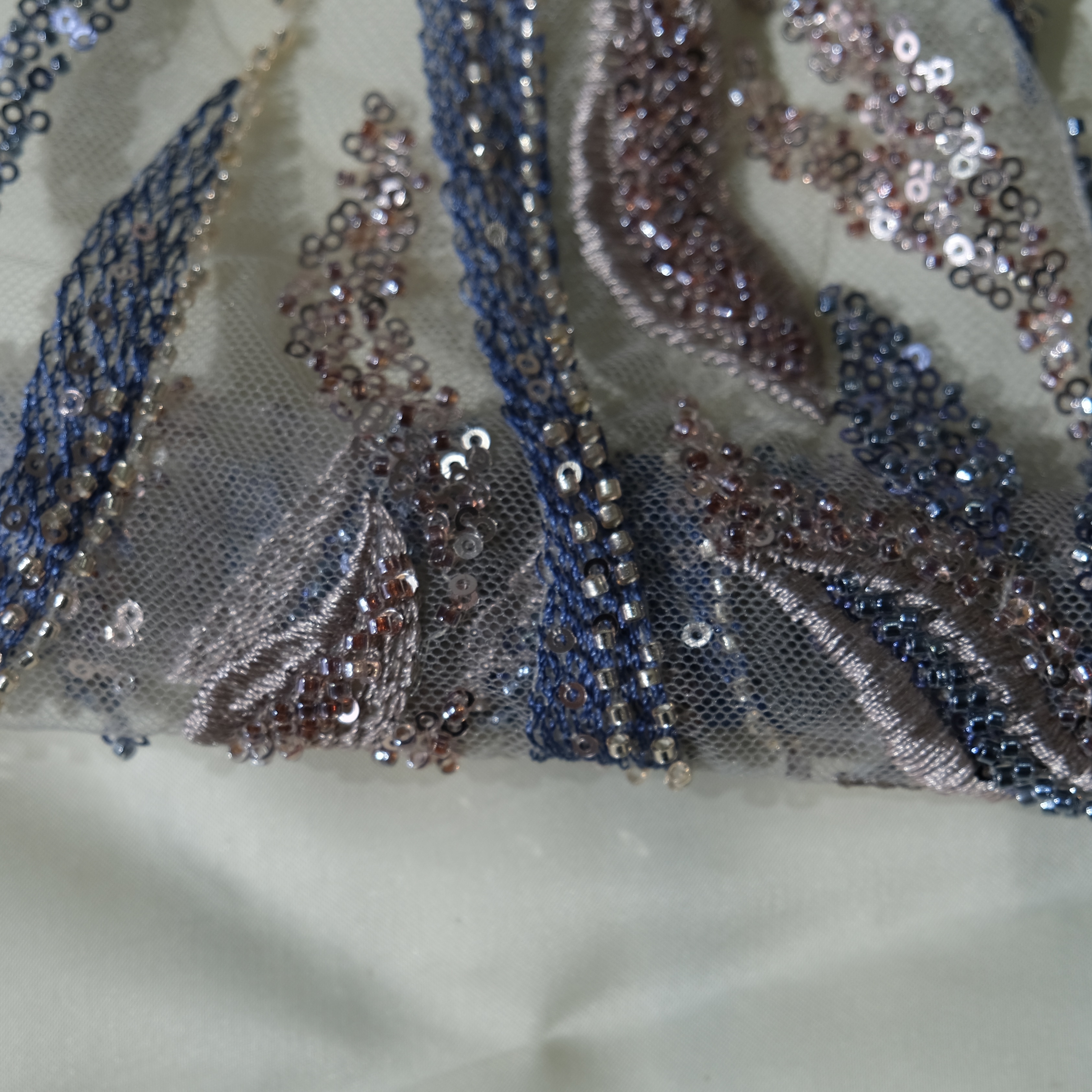 Flowing Flame Embroidery Fabric in BluePurple color