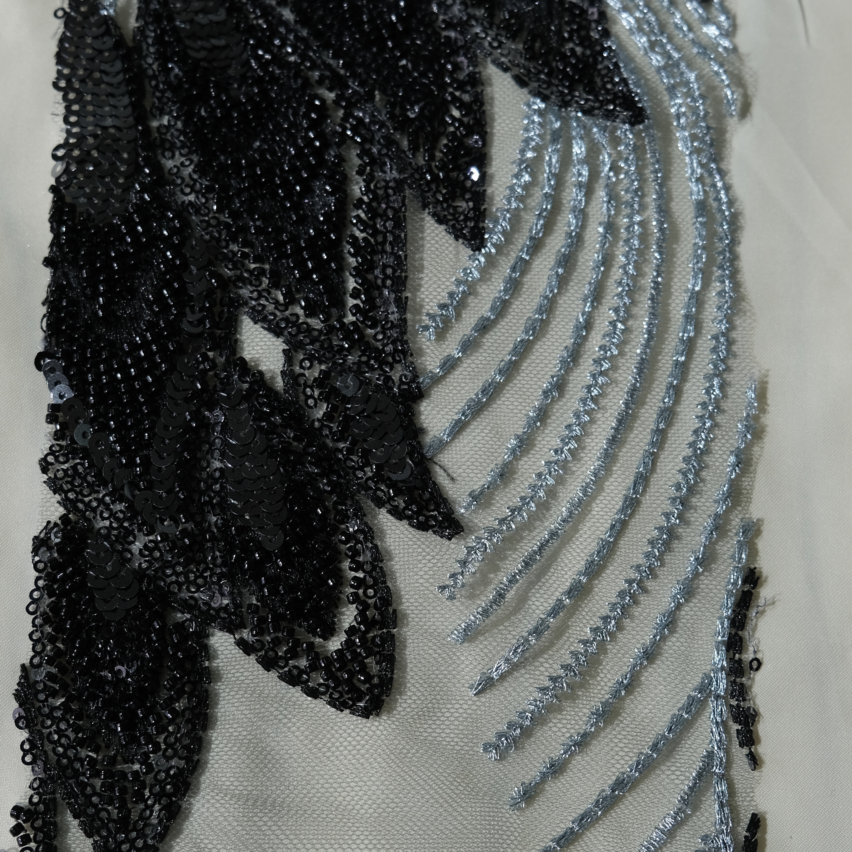 Peacock Feather Embroidery Fabric in BlueBlack color