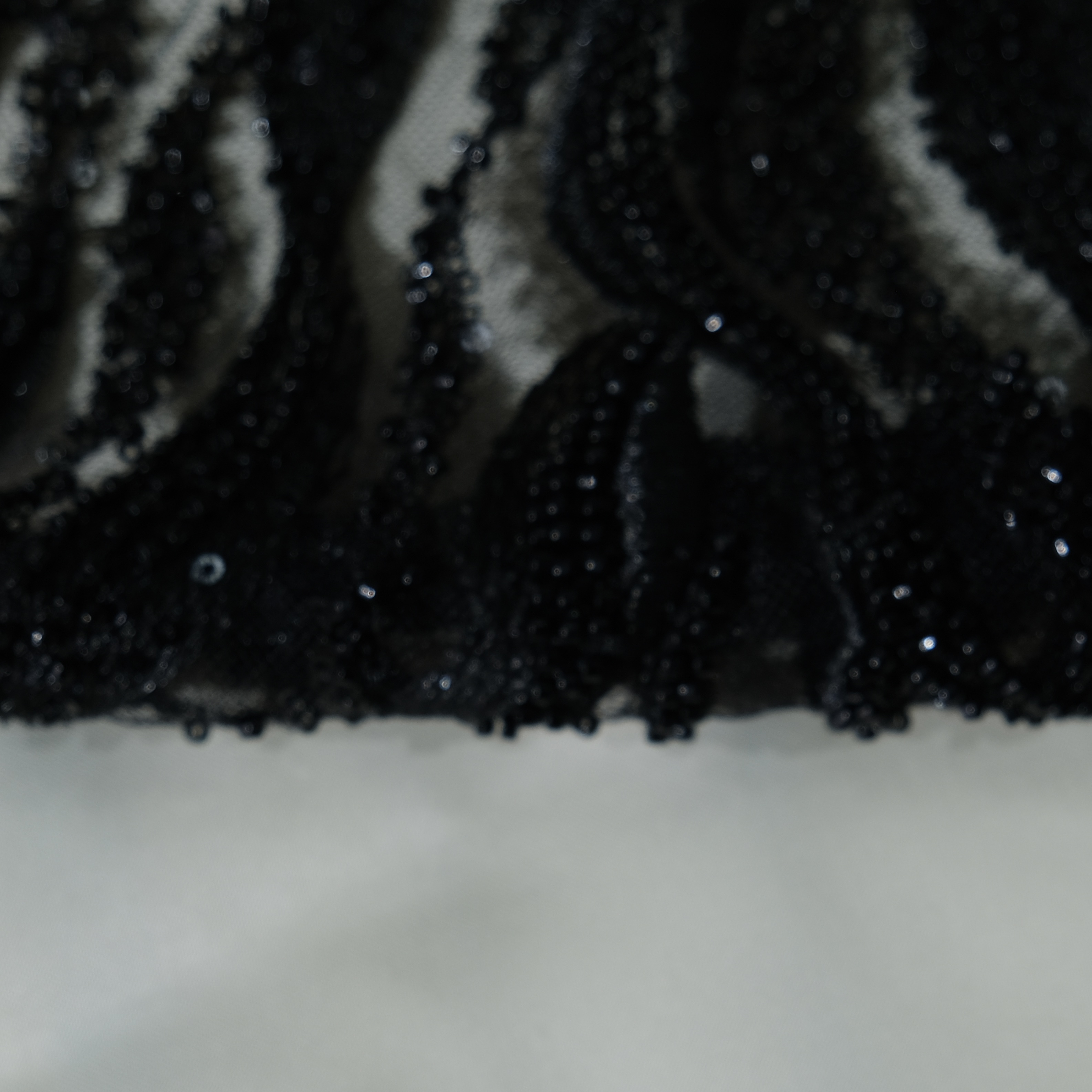 Flowing Flame Embroidery Fabric in Black color