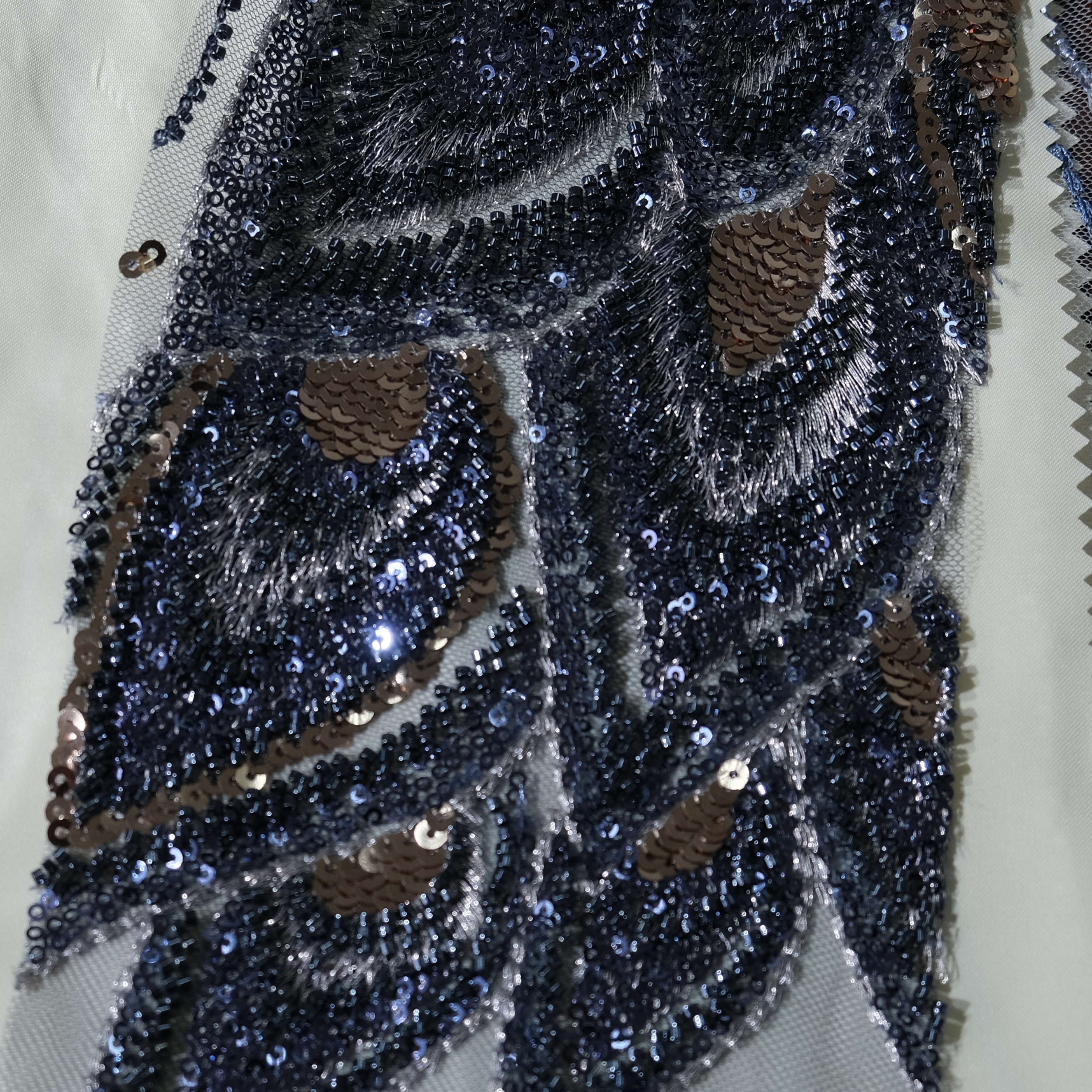 Peacock Feather Embroidery Fabric in NavyGolden color