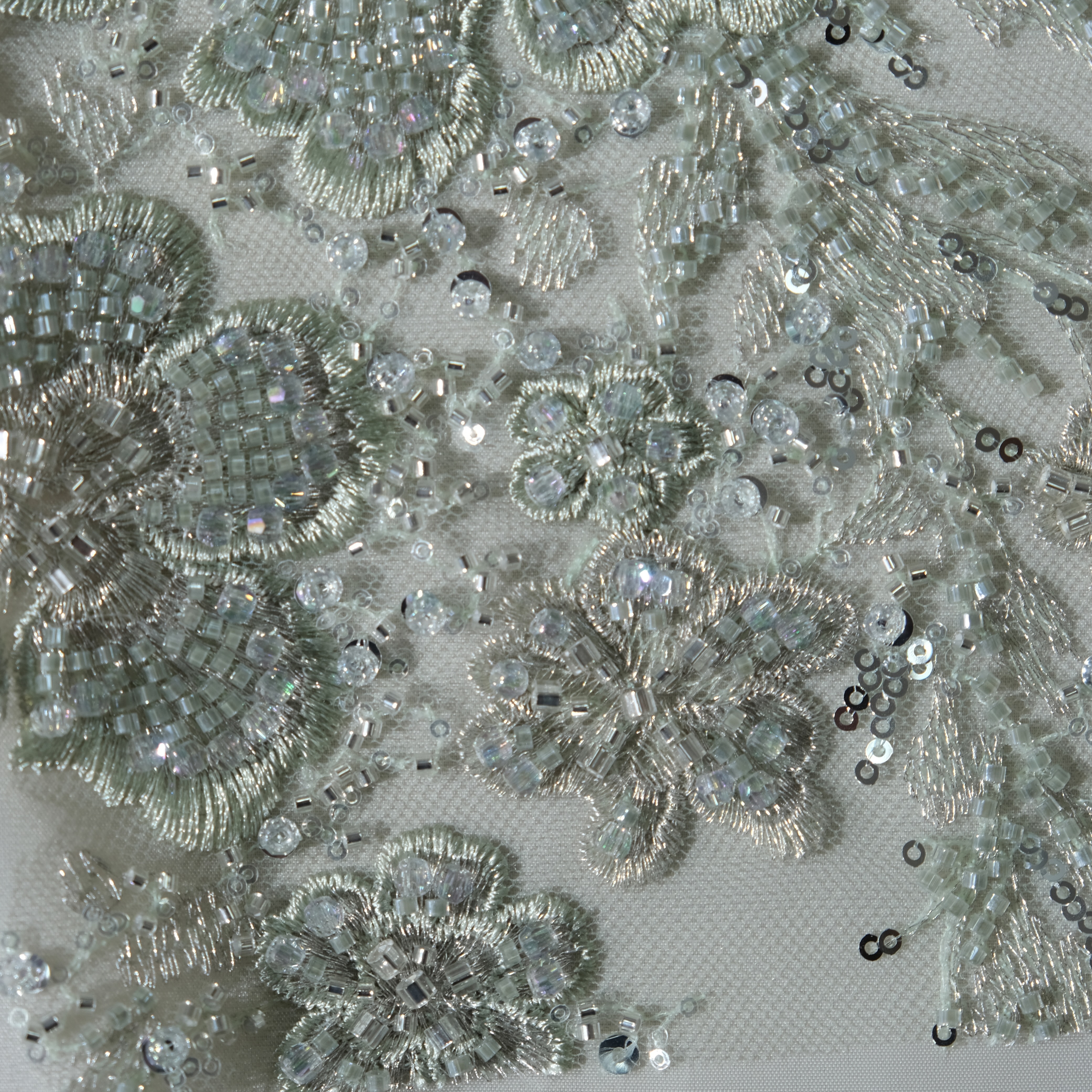 Radiant Floral Embroidery Fabric in LightGreen color
