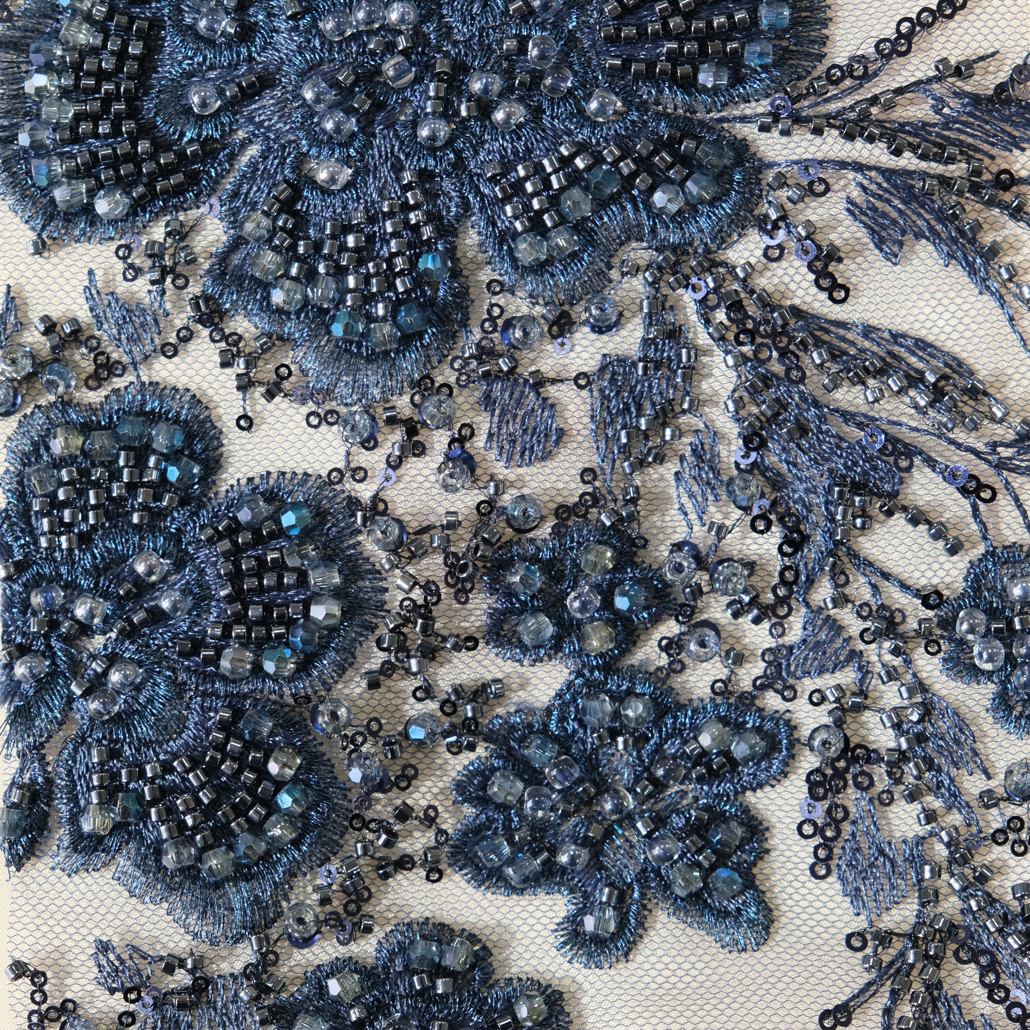 Radiant Floral Embroidery Fabric in Navy color