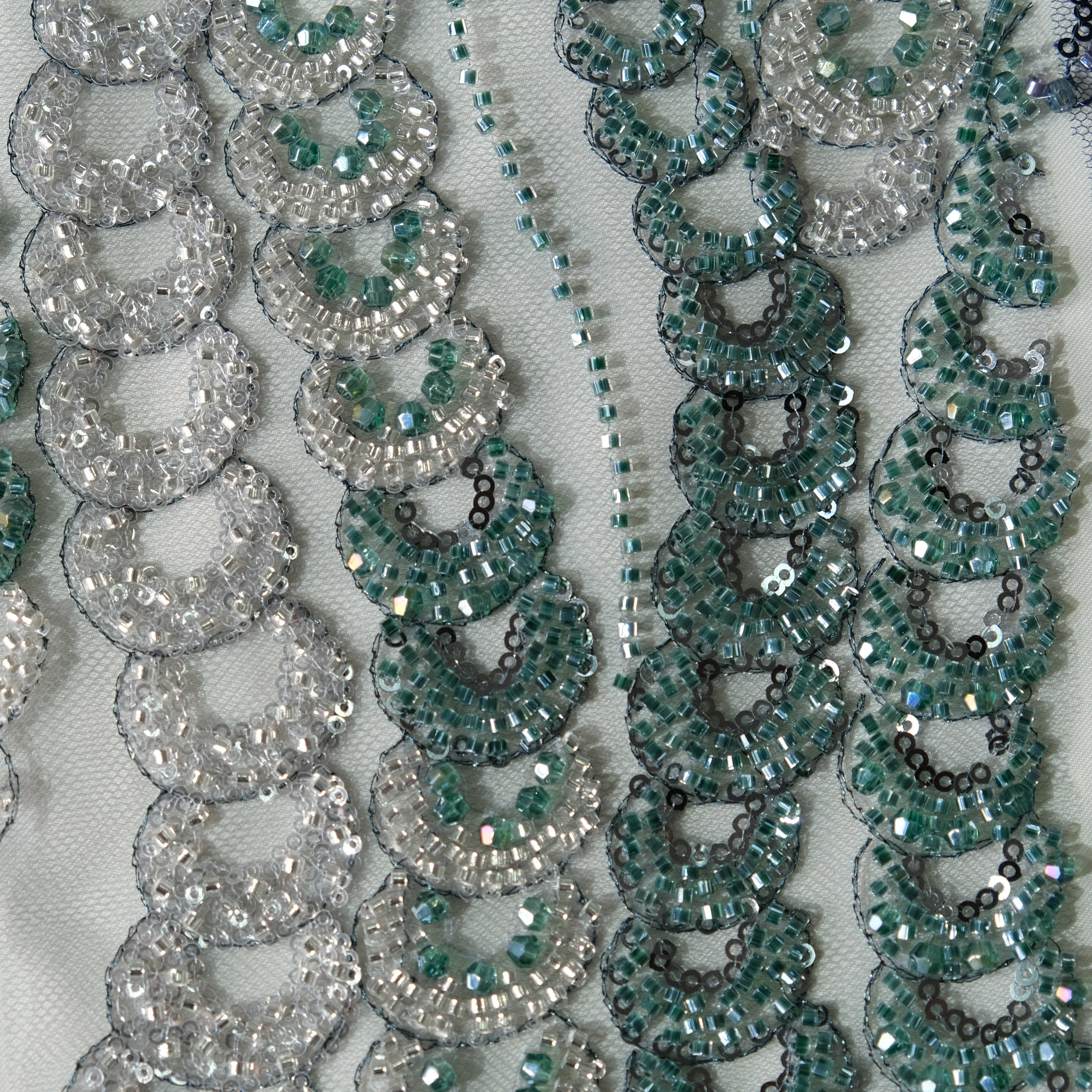 Flowing Chain Sequin Embroidery Fabric in Green color