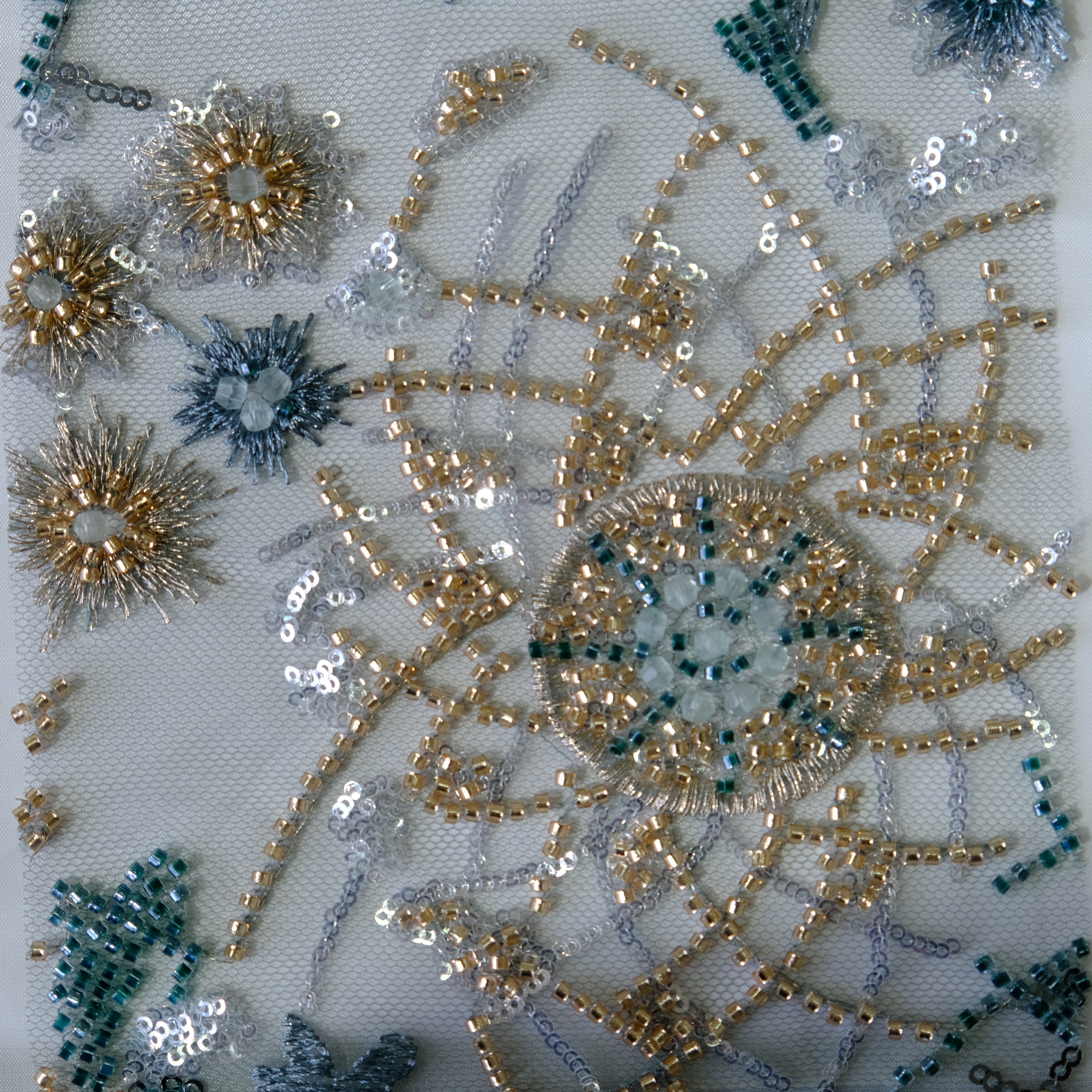 Spiderweb Floral Beaded Embroidery Fabric in Blue color