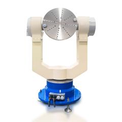 Close-up of precision rotary bearing on inertial navigation test table ensuring smooth motion control