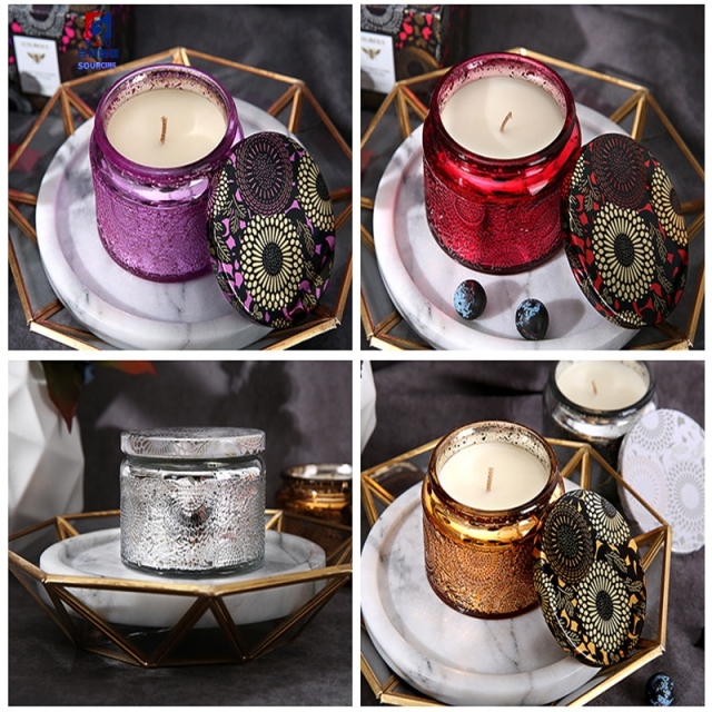An Empty Jar Of Colored Scented Candles