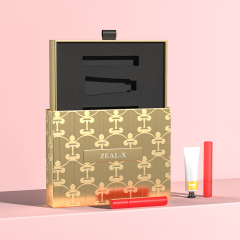 Zeal-X pull-out cosmetic gift box with embossed gold sleeve and precision-cut black EVA insert