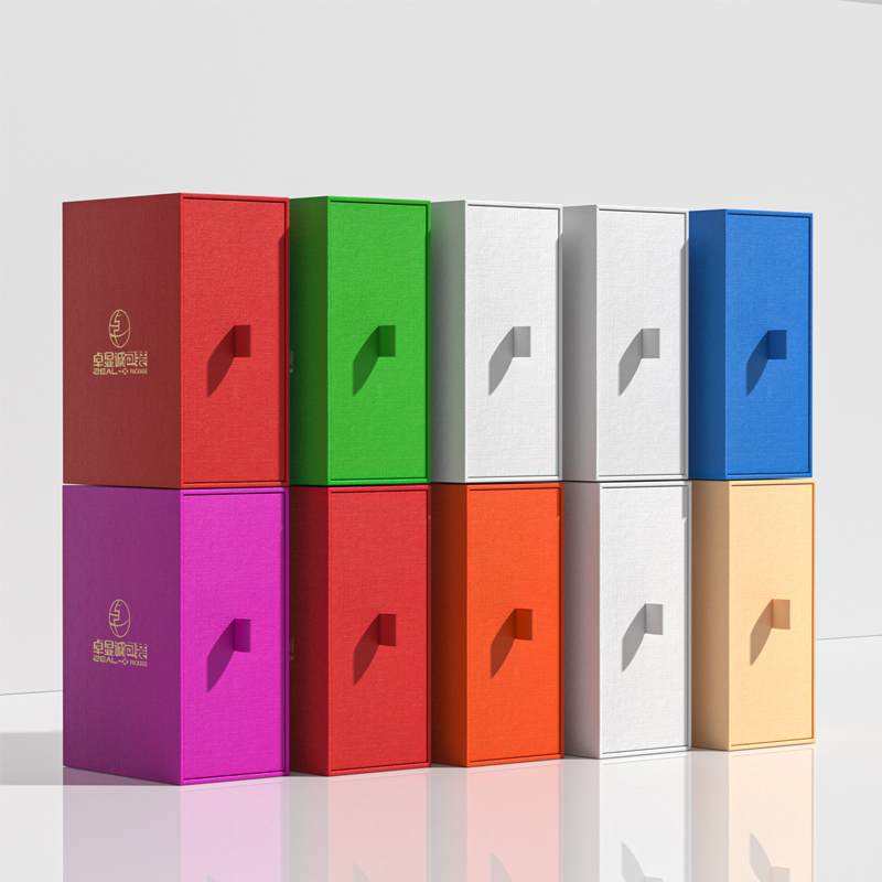 Row of colorful perfume drawer boxes in multiple sizes and colors, including red, green, white, blue and pink.