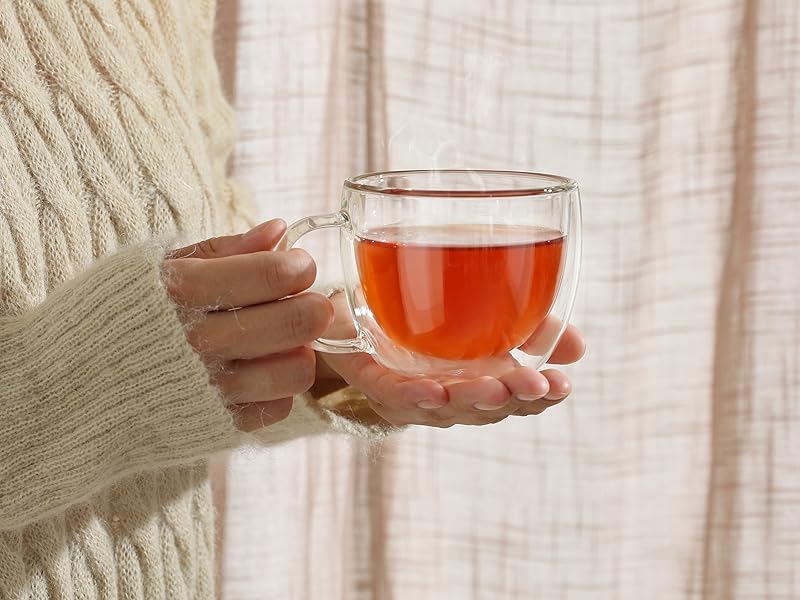 woman holding a cup of tea