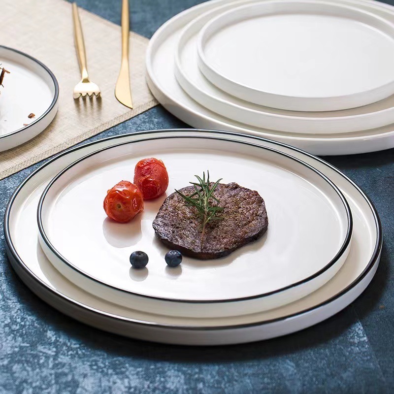 Modern Luxury Bone China Ceramic Plate Sets Cheap Wholesale Porcelain Dinnerware with Black Rim Plant Pattern for Restaurants