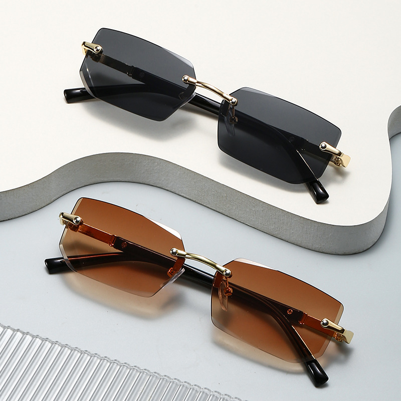 New rimless fashion sunglasses European and American trendy cut-edge sunglasses personalized jelly color sunglasses rimless sunglasses