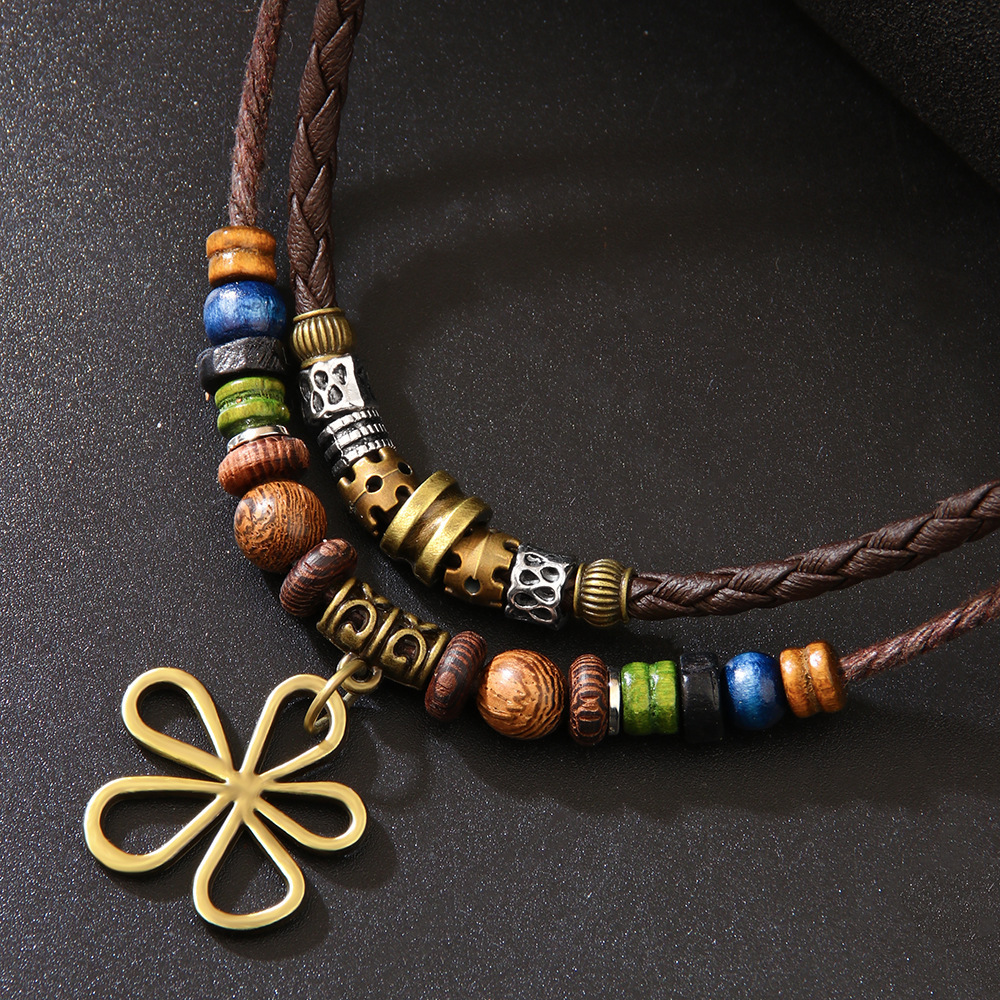 Trendy distinctive five-leaf clover beaded wax cord necklace/sweater chain and matching earrings set—a hot-selling fashion item