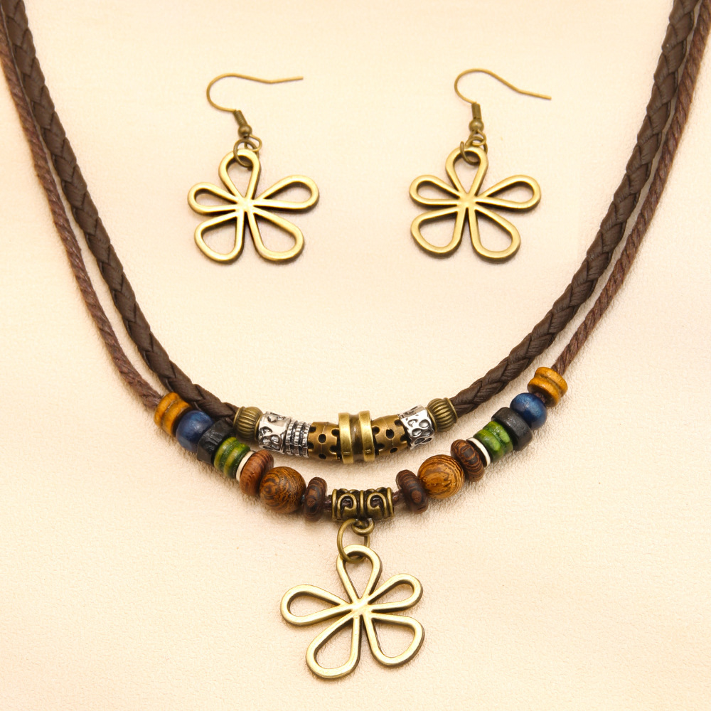 Trendy distinctive five-leaf clover beaded wax cord necklace/sweater chain and matching earrings set—a hot-selling fashion item