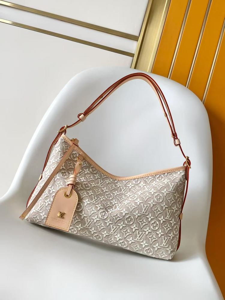 M2A136 Monogram Emblème version of the Carryall East-West bag.