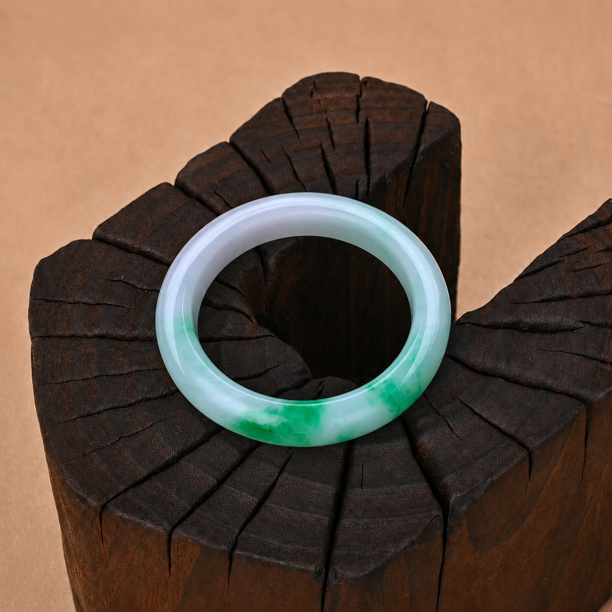 Fine-textured Semi-translucent White Jadeite Bangle with Vibrant Green Patches