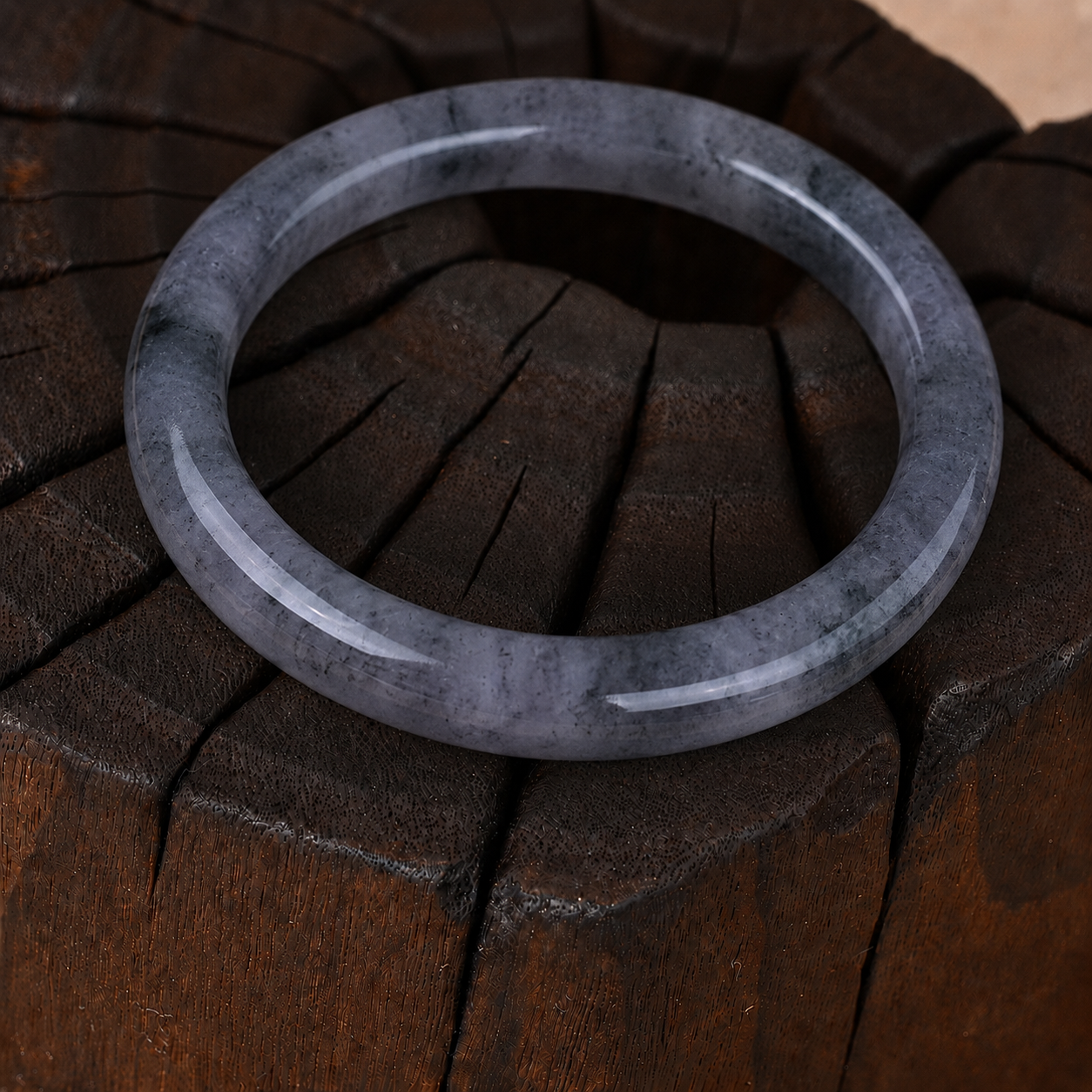 Fine-textured Ice-variety "Ink-splashed" Jadeite Bangle
