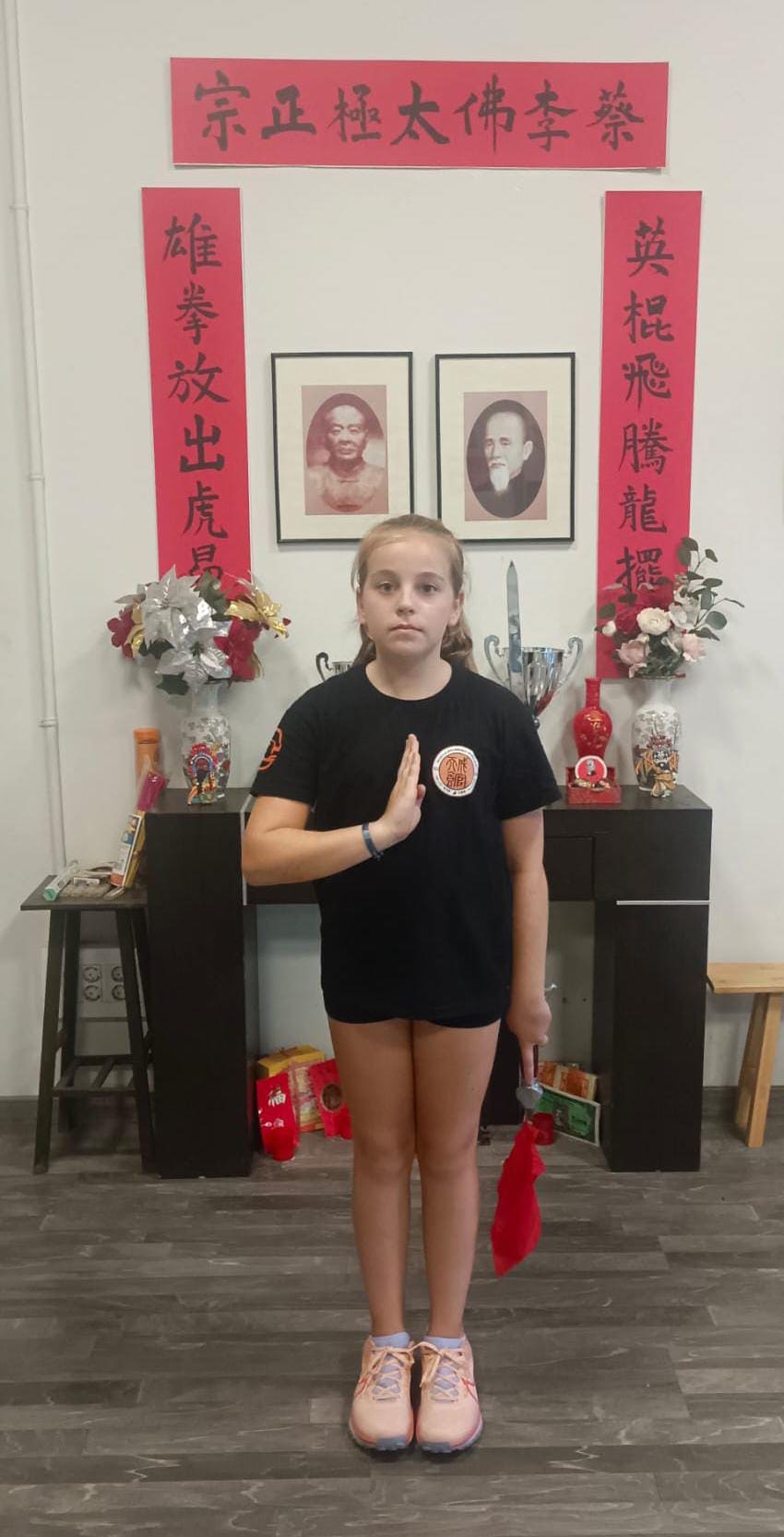 Bao Quan Li performed while holding a weapon