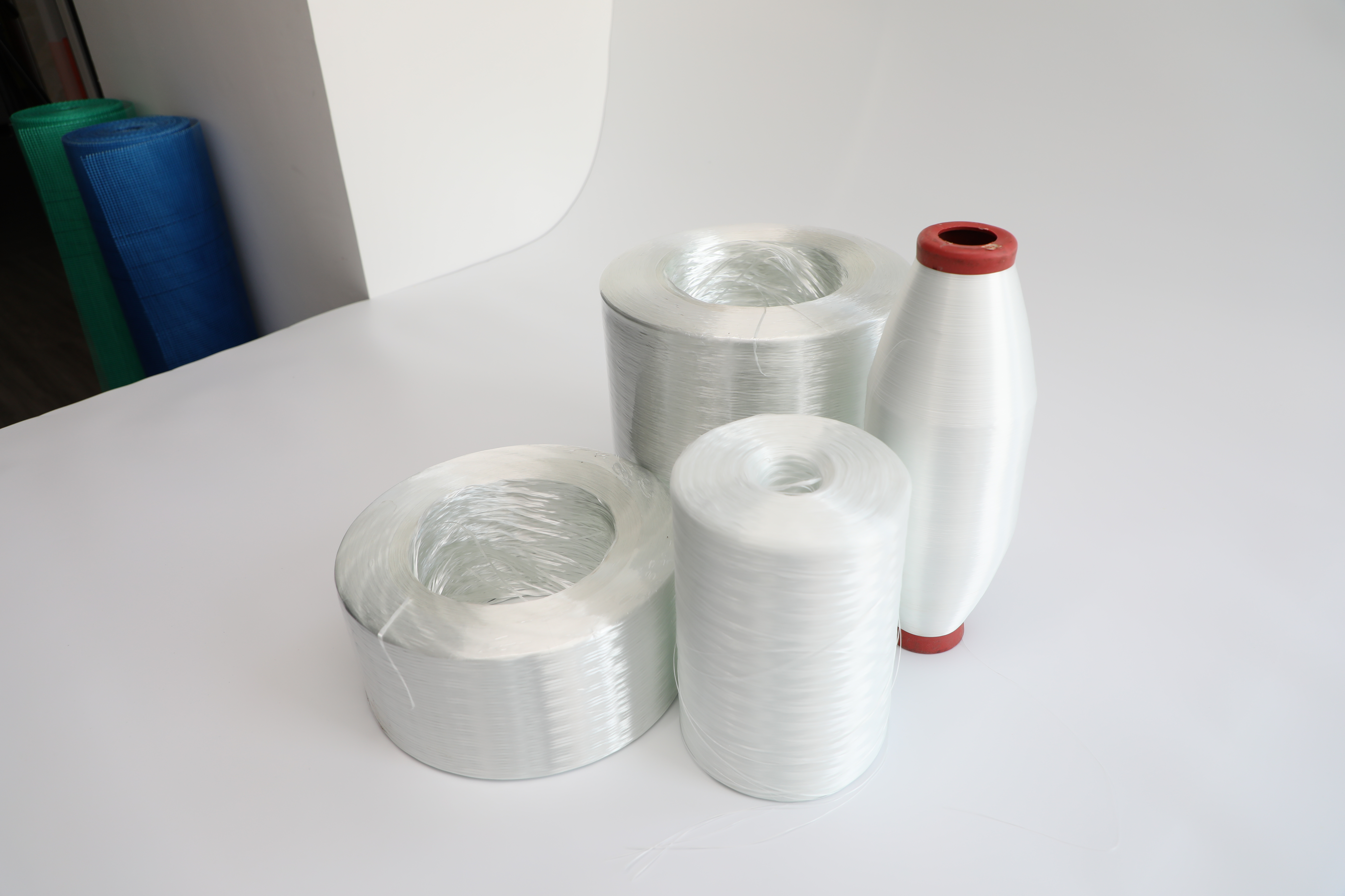Fiberglass yarn material for fabric routes
