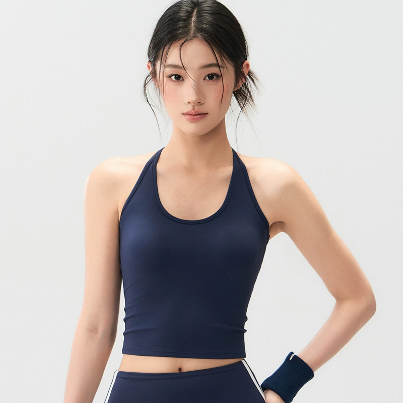 Deep blue one-piece women's sports vest can be worn externally