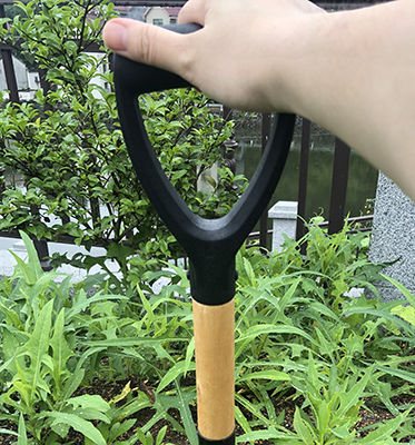 Garden shovel with wood handle