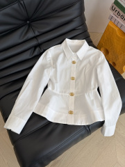 Elegant blouse decorated with iconic interlocking GG gold buttons., Cailan (Chongqing) International Trading Co., Ltd,Elegant blouse decorated with iconic interlocking GG gold buttons.
