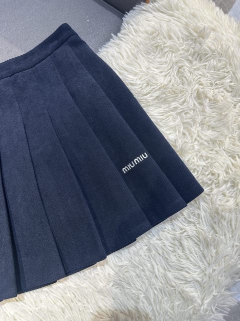 Cropped baseball jacket + high‑waist pleated midi skirt., Cailan (Chongqing) International Trading Co., Ltd,Cropped baseball jacket + high‑waist pleated midi skirt.- Cailan (Chongqing) International Trading Co., Ltd