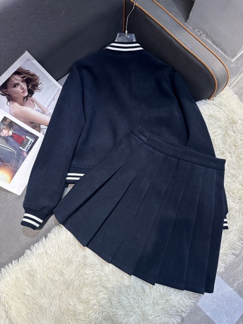 Cropped baseball jacket + high‑waist pleated midi skirt., Cailan (Chongqing) International Trading Co., Ltd,Cropped baseball jacket + high‑waist pleated midi skirt.- Cailan (Chongqing) International Trading Co., Ltd