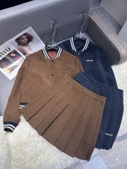 Cropped baseball jacket + high‑waist pleated midi skirt., Cailan (Chongqing) International Trading Co., Ltd,Cropped baseball jacket + high‑waist pleated midi skirt.- Cailan (Chongqing) International Trading Co., Ltd