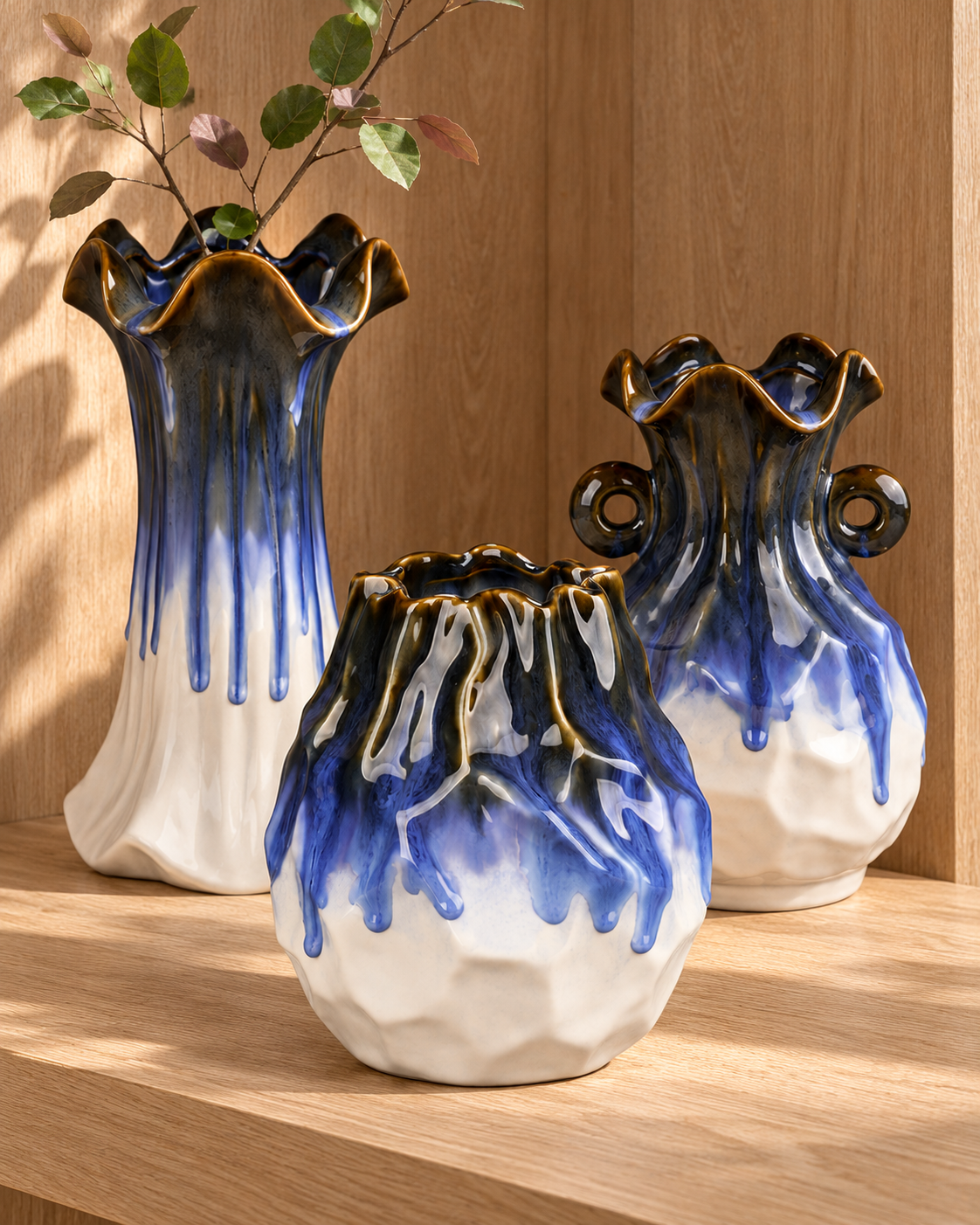 Blue drip ceramic floral vessel series grouped in a warm wood setting &ndash; ATW-S252313-A