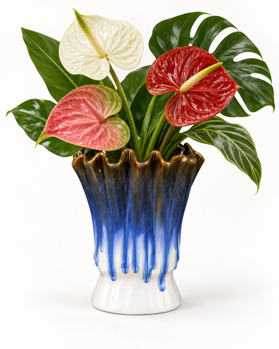 Fluted Blue Drip Ceramic Floral Vessel with anthurium leaf and tropical foliage on white – ATW-S252317-A