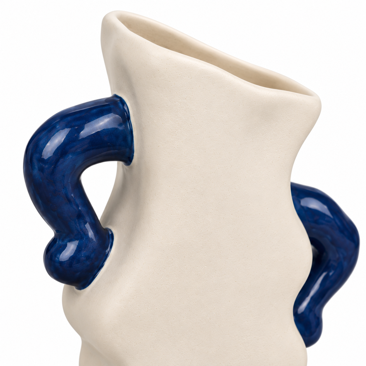 ATW-S252342-A sculptural wave cream and cobalt stoneware floral vessel close-up detail of rim handles and glaze