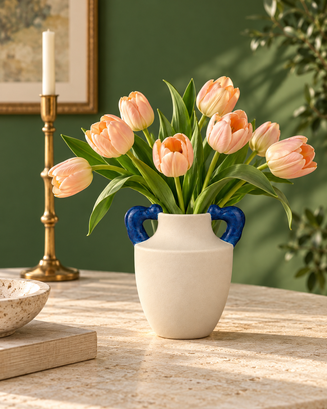 ATW-S252340-A cream and cobalt twin-handle stoneware floral vessel with botanical arrangement in styled interior