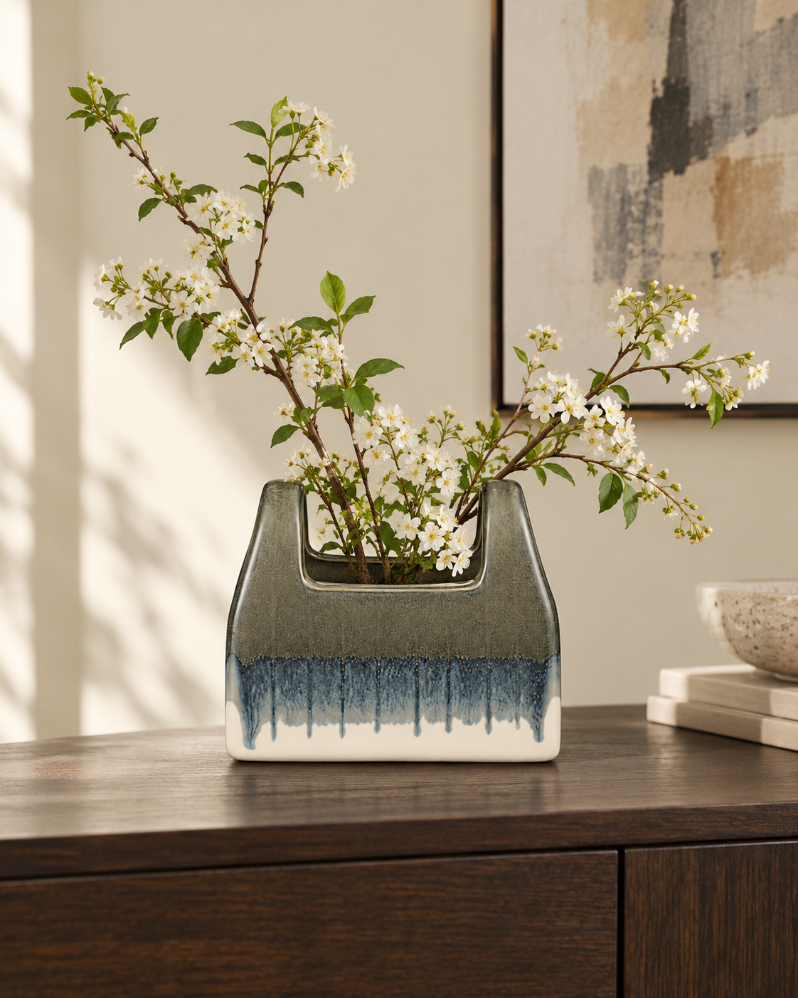 ATW-S252344-B charcoal drip basket-form stoneware floral vessel with botanical arrangement in styled interior