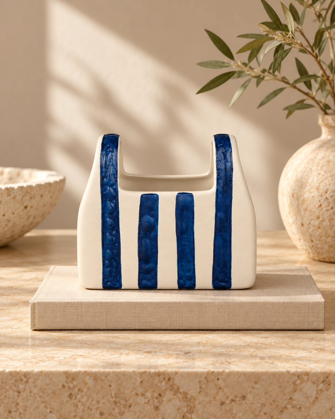 ATW-S252344-A cobalt stripe basket-form stoneware floral vessel empty in styled interior