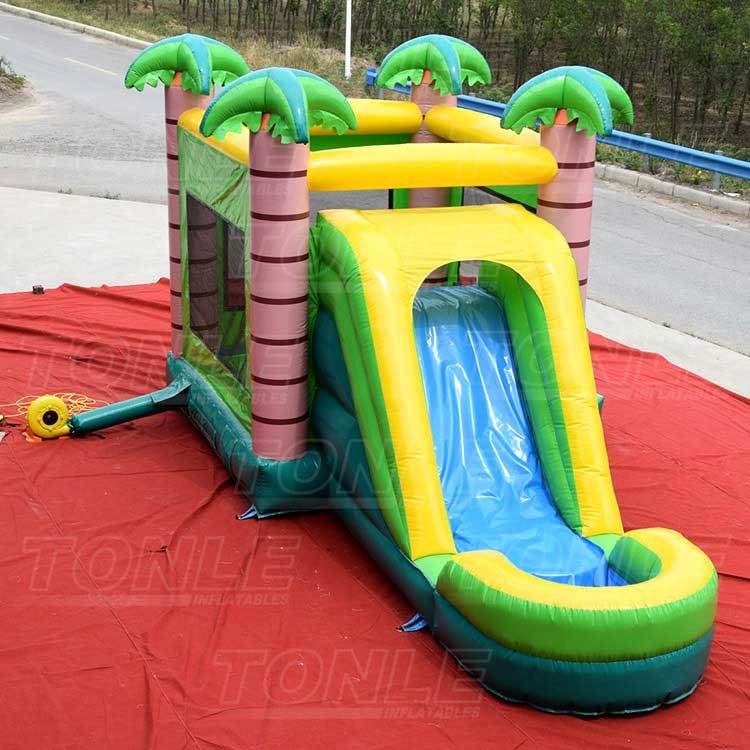 tropical palm tree inflatable combo jump castle bounce house with dual slides combo