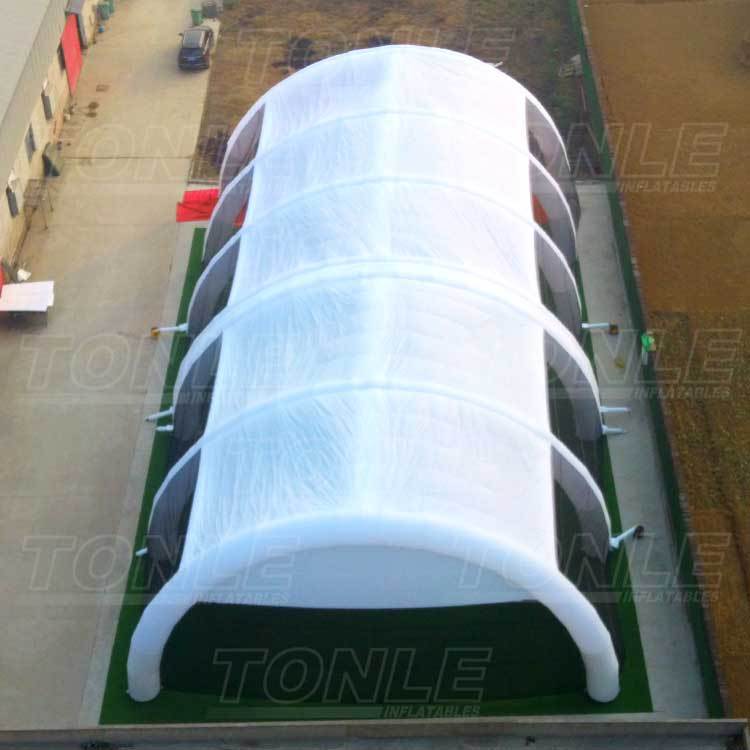 white inflatable paintball arena tent