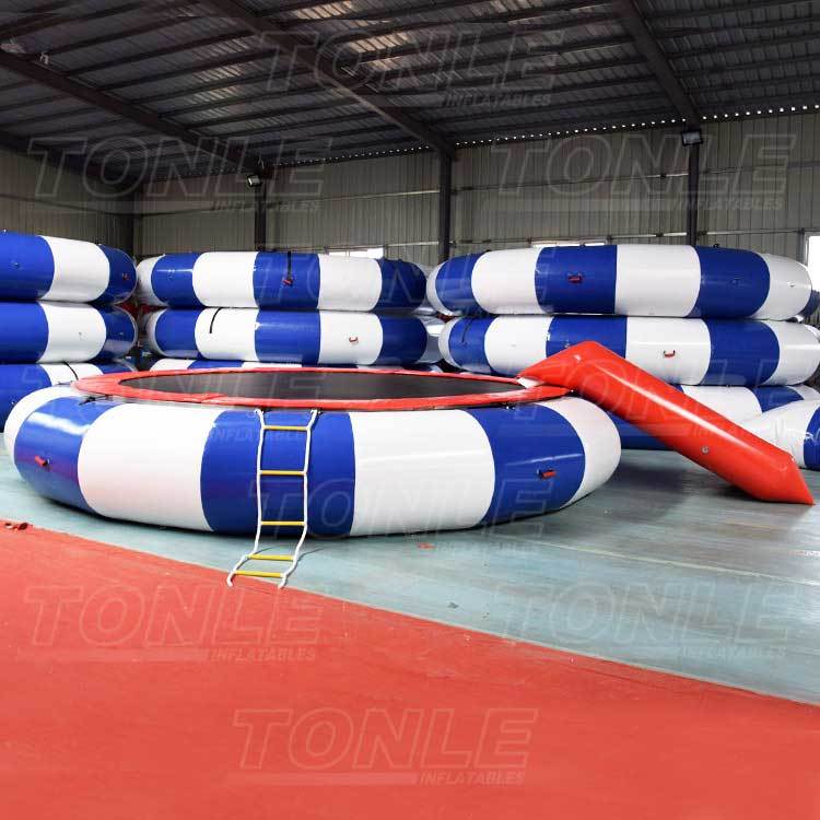 cheap inflatable floating water trampoline with slide