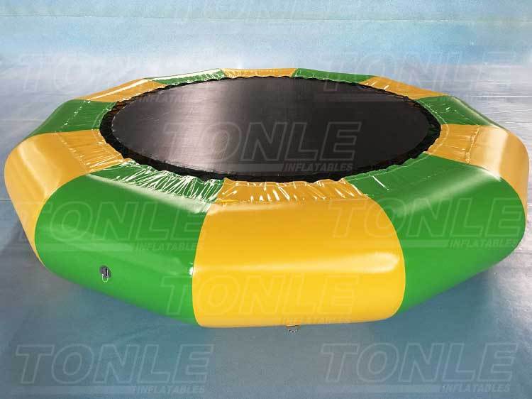 cheap inflatable floating water trampoline with slide