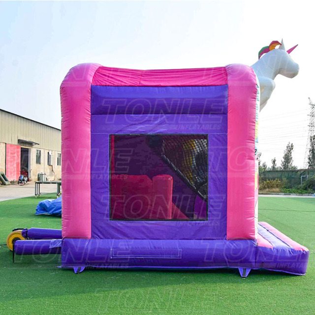 Commercial unicorn theme kids inflatable bounce house with dry slide for sale