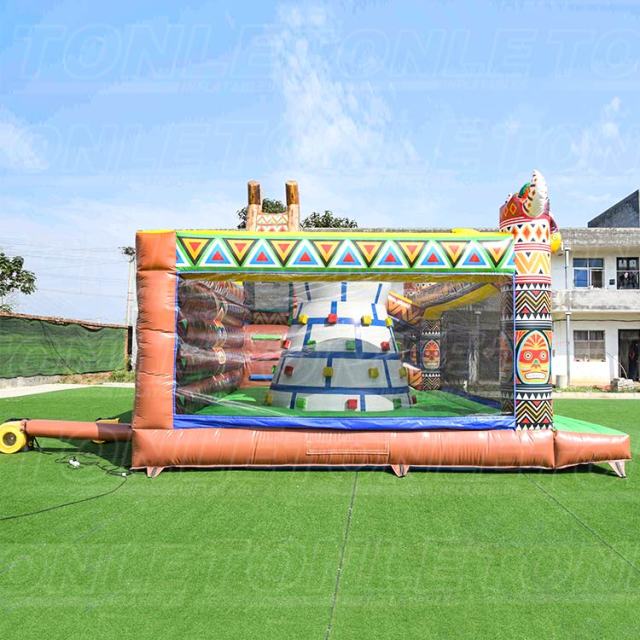 new design theme inflatable playground with rock climbing wall for sale