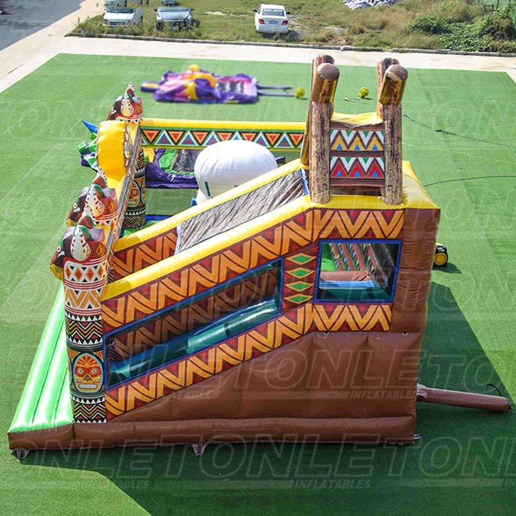 new design theme inflatable playground with rock climbing wall for sale