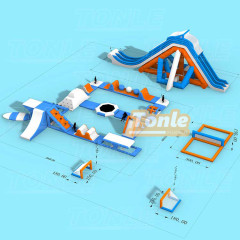 Large inflatable water park with inflatable flotation obstacles