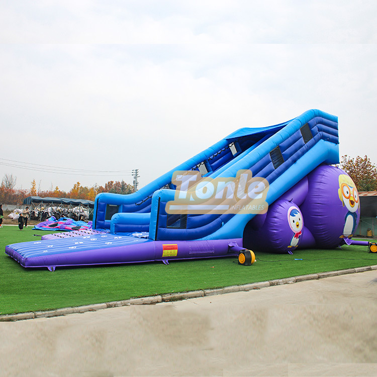 Supplier sells 50ft penguin theme large inflatable dry slide