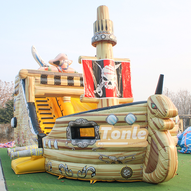 Vendor sells pirate ship themed inflatable slides
