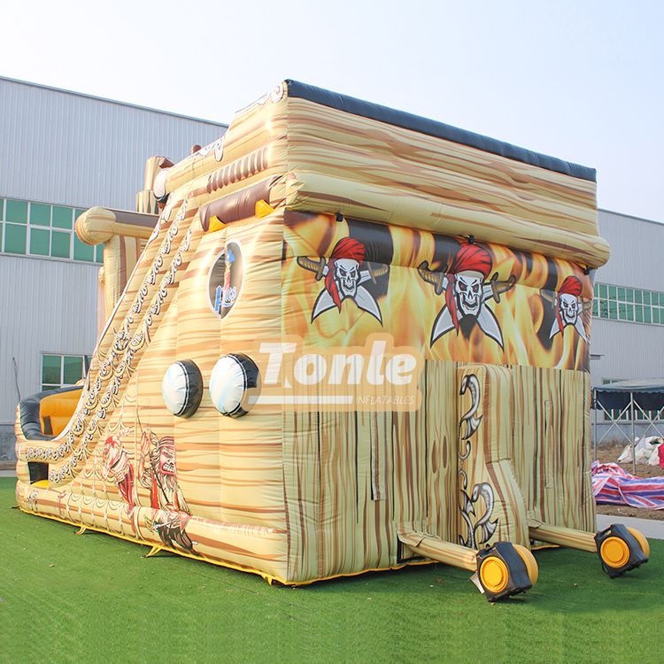 Vendor sells pirate ship themed inflatable slides